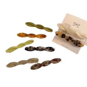 Elegant twist hair clip set in assorted acetate marble patterns and solid colors