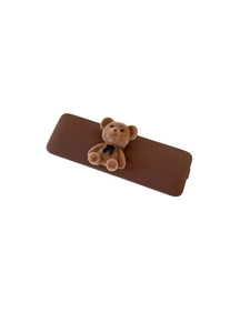 Cute brown plush bear hair clip with bow tie on cream rectangle base for women