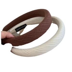 Chic padded knit headbands in brown and beige colors with a high crown volume design