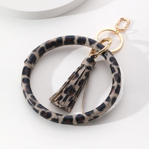 Leopard print PU leather wristlet keychain with matching tassel and gold metal hardware