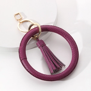 Minimalist purple PU leather wristlet keychain with gold metal ring and fringe tassel