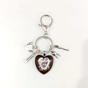 Nurse appreciation keychain with heart pendant and dental charms for dental hygienists