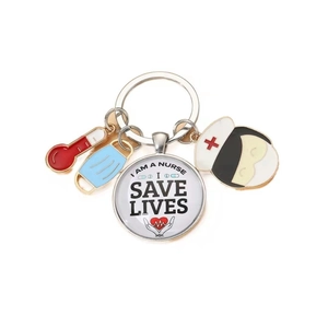 Nurse appreciation keychain with medical charms and I Am A Nurse Save Lives round pendant