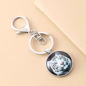White tiger time gem keychain featuring a realistic tiger portrait with a silver alloy ring