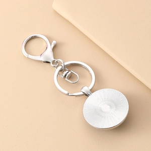 Silver metal tiger glass gem keychain with lobster clasp and round pendant tray charm