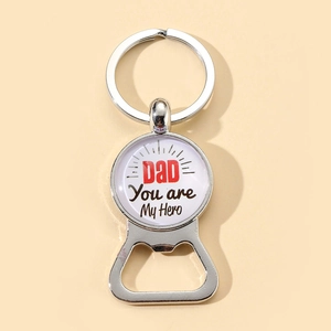 Detail of metal bottle opener keychain with Dad You Are My Hero glass dome art