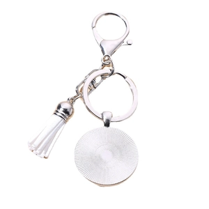 Silver alloy Tree of Life keychain with white leather tassel and round pendant tray