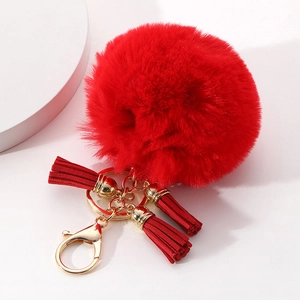 Porte-clés en fausse fourrure rouge vif avec pompon assorti et fermoir doré chic