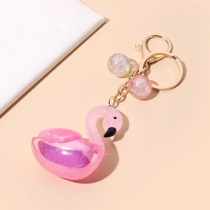 Porte-clés flamant rose à sable mouvant avec paillettes et anneau doré chic