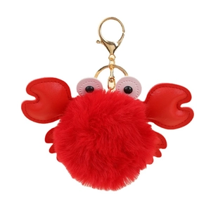 Red plush crab pom pom keychain with gold metal ring and PU leather claws for bags