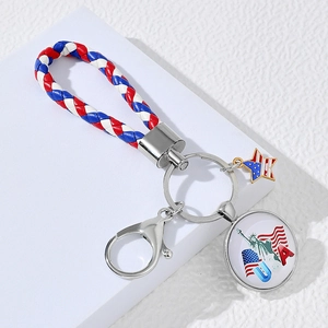 Braided leather USA flag keychain with star pendant and Statue of Liberty emblem