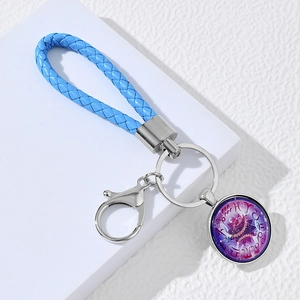 Porte-clés zodiaque en cuir tressé bleu avec pendentif en cristal et décapsuleur
