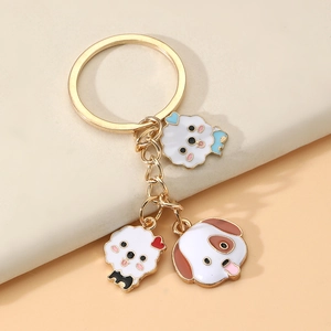 Cute cartoon dog keychain with golden rings and multi-color enamel charms for bags