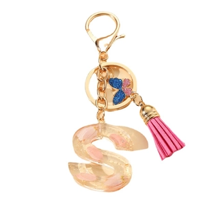 Resin letter S keychain with pink petals gold foil flakes and colorful silk tassel charm
