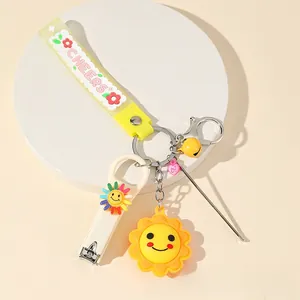 Detail view of sunflower nail clipper set with yellow wrist strap and ear pick tool