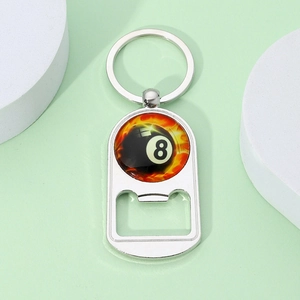 Polished silver metal bottle opener keychain featuring a black 8 ball and fire design