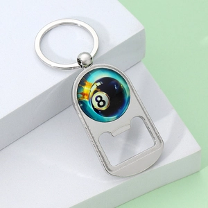 Polished metal pool 8-ball bottle opener keychain on a minimalist white stand