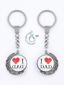 Detail view of the 360-degree rotating silver metal pendant with I Love Dad inscription
