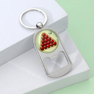 Silver metal billiard ball bottle opener keychain showing a red snooker triangle design