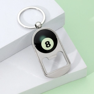 Close-up of a silver metal 8-ball billiard keychain with a functional bottle opener feature