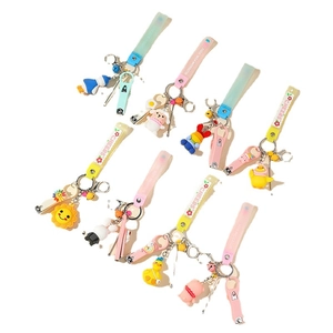 Cartoon nail clipper keychain set with colorful silicone wristlets and animal pendants