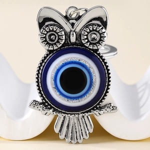 Creative owl keychain with blue evil eye amulet and silver metal finish for bags