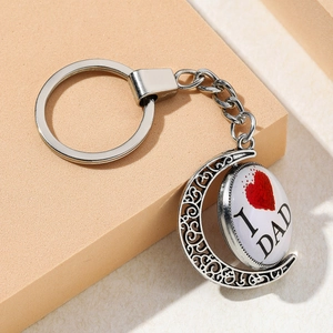 Father's Day silver keychain with rotating moon pendant and I Love DAD heart engraving