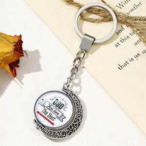Detail of metal Father's Day keychain with Dad You are The Best rotating pendant
