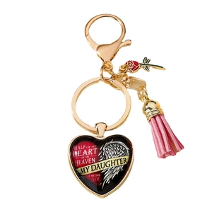 Porte-clés cœur avec ailes d'ange et pompon rose pour cadeau de fête des mères