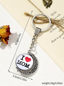 Detail view of rotating silver heart keychain with I Love Mom text and red heart charm
