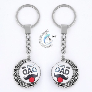 Detail of 360-degree rotating Father's Day keychain with I Love My Dad illustration