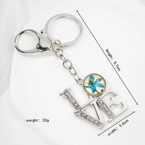 European vintage silver LOVE keychain with blue dried flower and zircon inlay charms