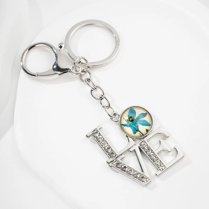 European vintage silver LOVE keychain with sparkling crystals and blue flower gemstone