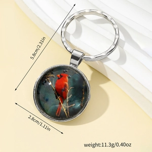 Silver keychain with Northern Cardinal bird glass pendant and wavy ring showing dimensions