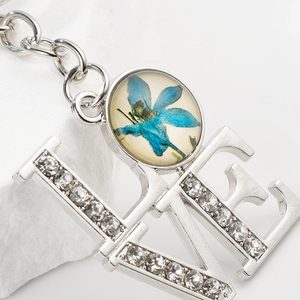 European vintage floral LOVE keychain with silver metal and sparkling rhinestones