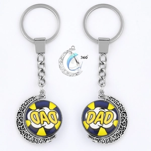 Polished silver DAD keychain with 360-degree rotating round logo and crescent moon frame