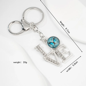 Silver LOVE keychain with blue butterfly glass pendant and sparkling rhinestones