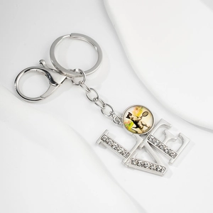 Silver LOVE keychain with sparkling rhinestones and a vintage cat charm pendant