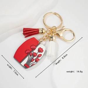 Porte-clés floral européen avec gland en cuir rouge et anneau et fermoir en métal doré