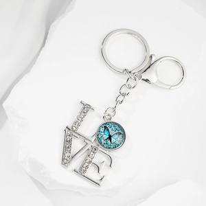 Silver LOVE keychain with blue butterfly glass pendant and crystal rhinestones for women