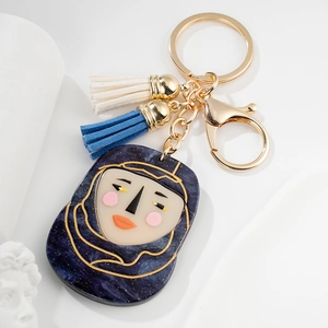 Portachiavi con Ciondolo a Forma di Viso Femminile Cielo Stellato Artistico Europeo con Doppie Nappe Pendente per Borsa in Resina di Metallo alla Moda per Donna