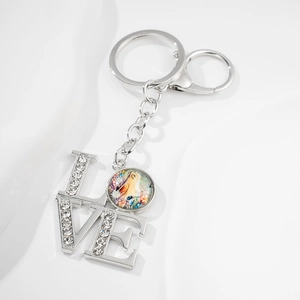 Silver LOVE keychain with sparkling rhinestones and a colorful unicorn glass pendant