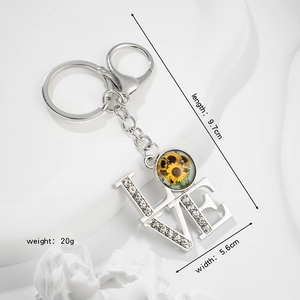 Silver LOVE keychain with rhinestone accents and sunflower gem pendant jewelry