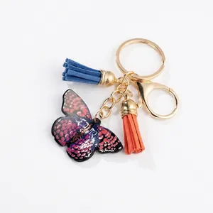 Fashion butterfly keychain with colorful tassels and black metal insect pendant for bags