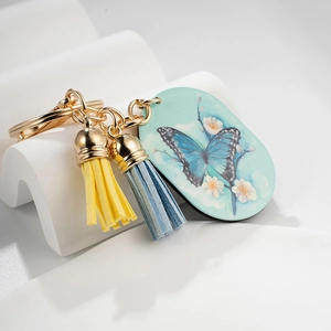 European style butterfly keychain with colorful tag and two vibrant decorative tassels