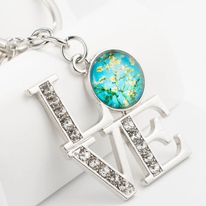 Silver LOVE keychain with rhinestone accents and Van Gogh almond blossom glass pendant