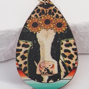 Creative teardrop cow print keychain with sunflower crown and leopard pattern design