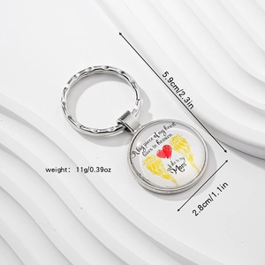 Detailed view of silver memorial key ring with dimensions 5.9cm long and 2.8cm wide