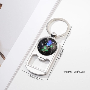 Detailed view of metal bottle opener keychain with blue rose pattern and size dimensions