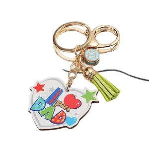 Father's Day heart keychain with colorful I Love You Dad print and green tassel